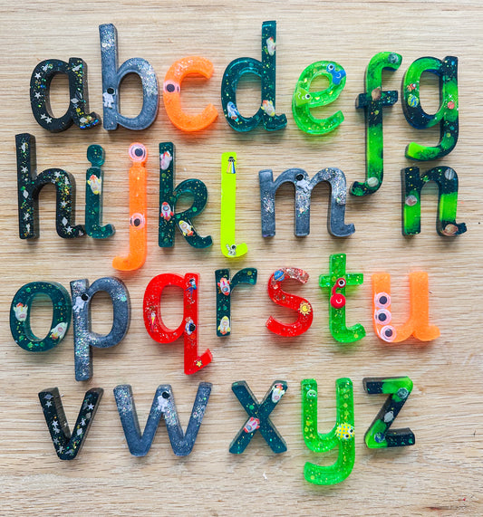 Aliens, planets and space themed letters